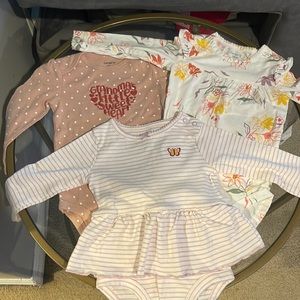 Three long sleeve onesies.